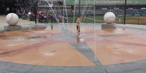 Kid peeing in the stadium sprinklers!
